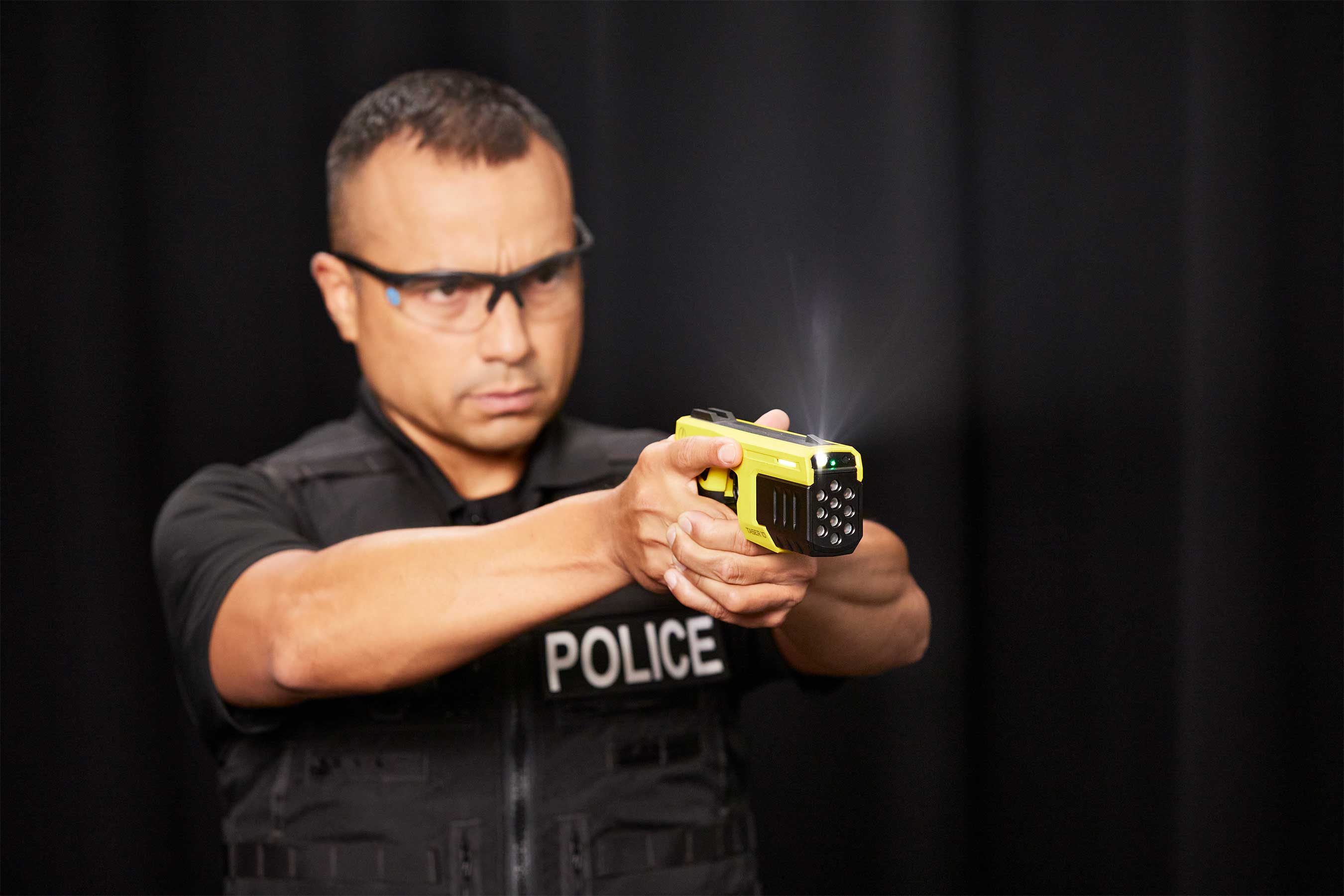 man shooting taser